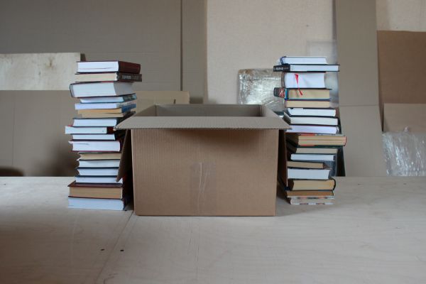 Сколько вмещается книг в коробку